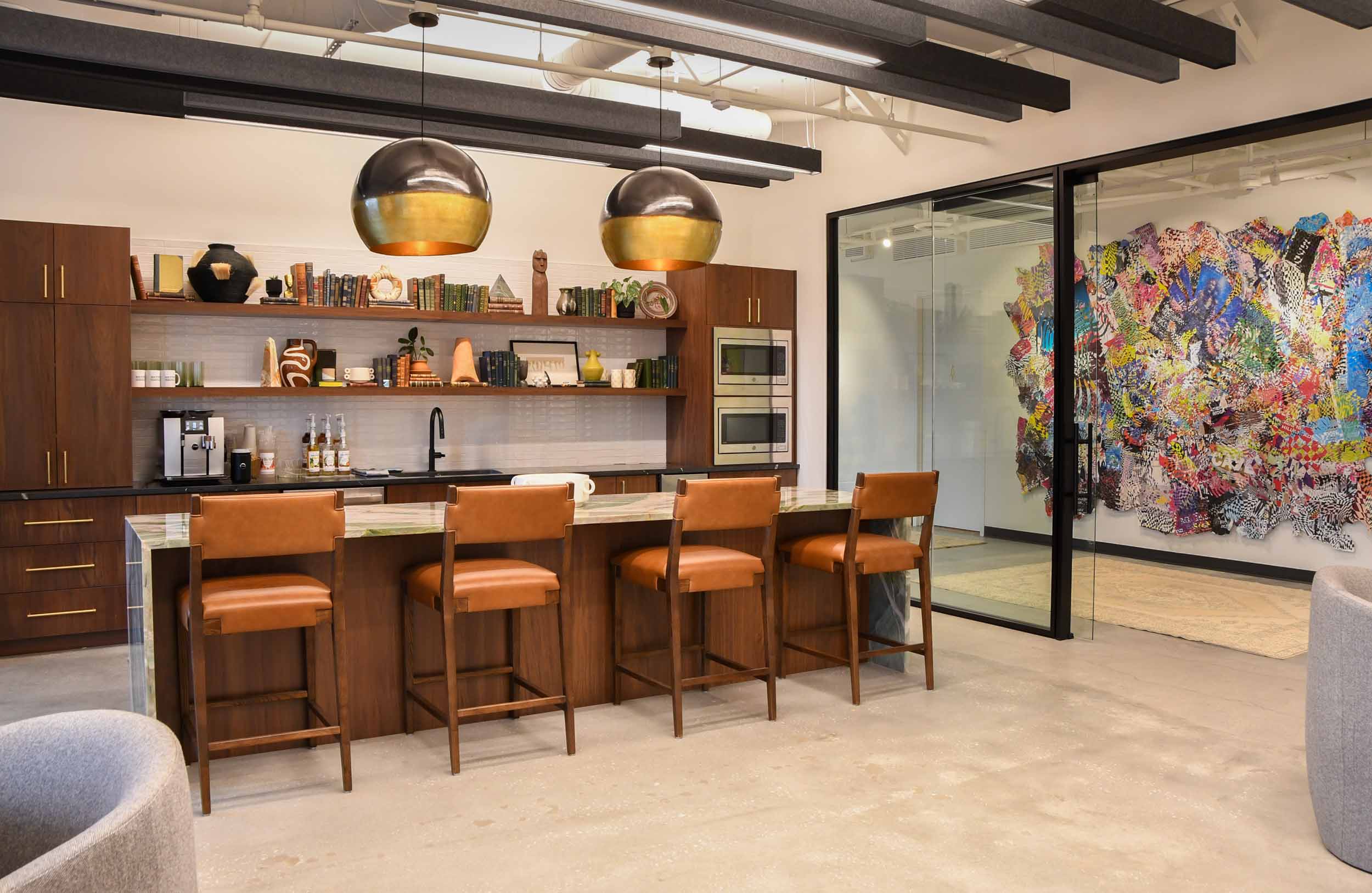 Comfortable bar seating in room designed by Planning Interiors